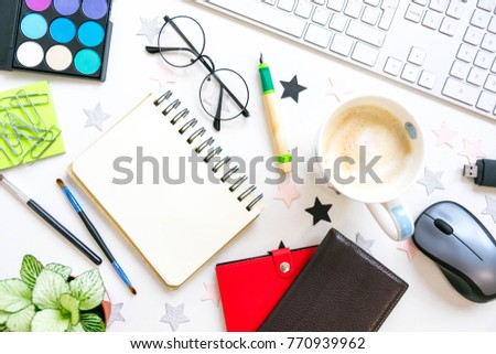 Stylish office table desk. Workspace with laptop, diary, succulent on white background. Flat lay, top view. trendy office