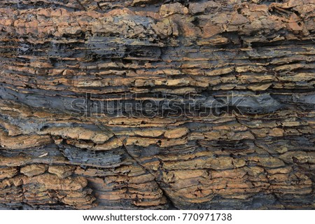 sedimentary rock pattern texture background. Royalty-Free Stock Photo #770971738