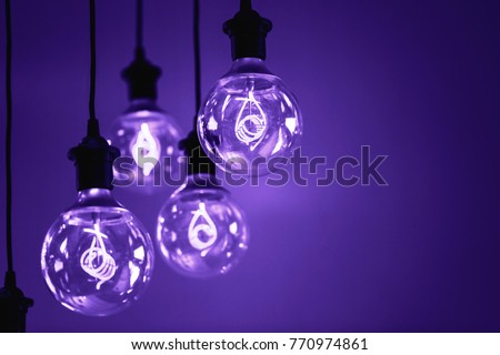 Group of Ultra Volet lamps with interesting shape of tungsten filament. . Color of the year 2018. Royalty-Free Stock Photo #770974861