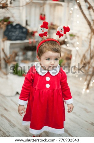 Little santa girl in christmas mood