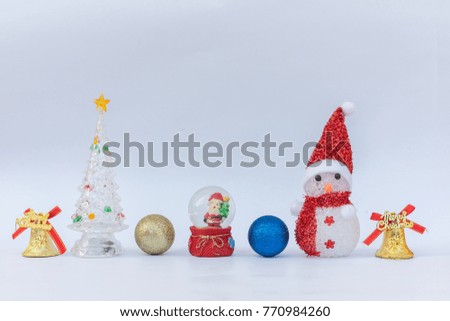 In the picture there are gifts and a snowman. Merry christmas and happy new year.
