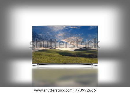 Modern 4K oled tv with italian countryside image in white background Royalty-Free Stock Photo #770992666