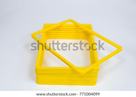 yellow plastic frames for price tags. Equipment for shops