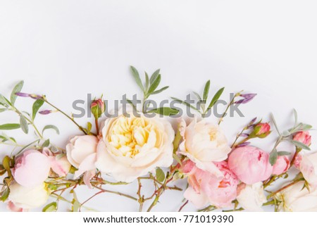 Festive flower English rose composition on the white background. Overhead top view, flat lay. Copy space. Birthday, Mother's, Valentines, Women's, Wedding Day concept.