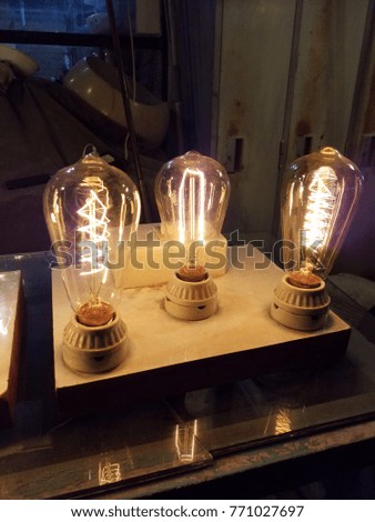 Vintage light bulb at midnight
