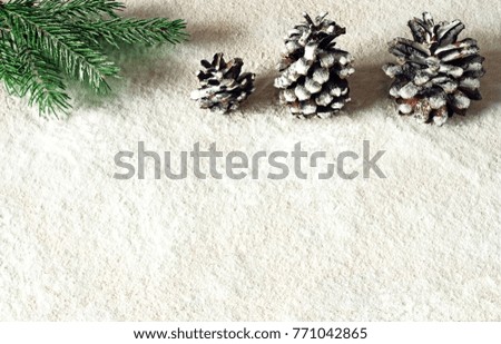 Christmas background with snow, 
White Christmas background with snow, fir cones and a fir branch
