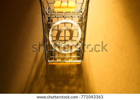 at sign on the shopping cart