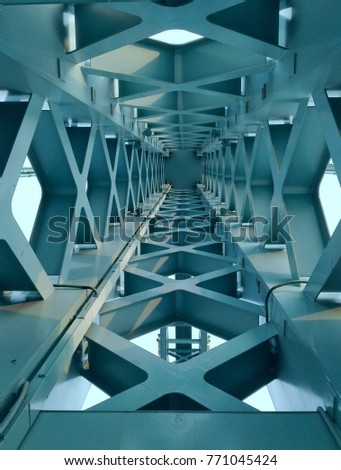Blue colored metal construction bridge in Wuhan, China