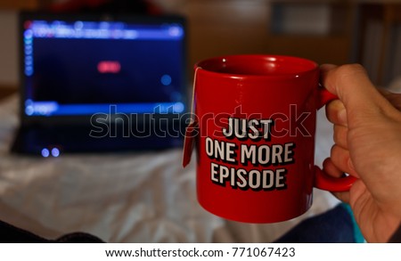 Watching series with a cup of tea. Just one more episode 2 Royalty-Free Stock Photo #771067423