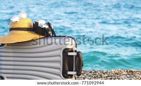 Beach bag on sand. Summer vacation and travel concept