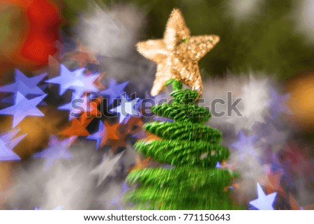Beautiful toy of the christmas tree on abstract background