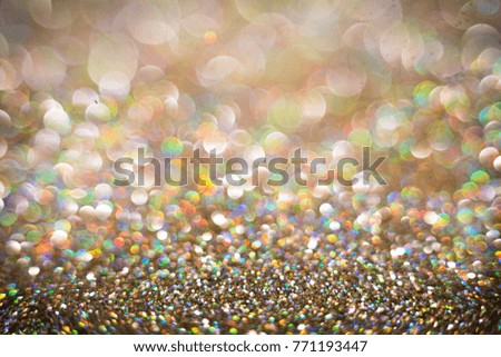 colorful glitter background with bokeh abstract blur effect 