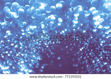 colorful glitter background with bokeh abstract blur effect 