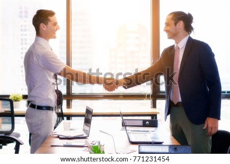 Business handshake and people. Handshake Business concept in office.
