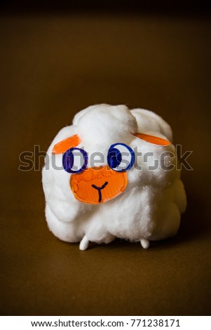 Do it yourself handmade cute sheep from cotton balls. DIY Sheep as decorative elements for a Christmas season, Easter and Sunday school teaching