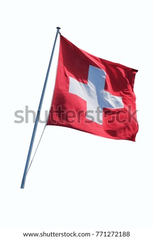 Swiss flag flying on a metal pole, isolated on a white background with clipping path 