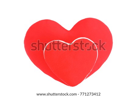 Two red hearts pillow overlap on white background