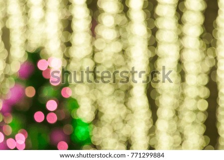 Colorfully beautiful night-time Christmas tree and decoration bokeh.