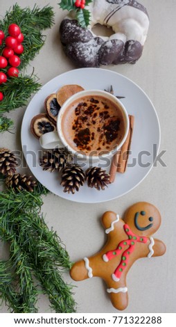 Hot chocolate drink,chocolate candy,gingerbread man and sweet christmas bread wreath / Christmas Food and Drink / Pampered yourself with some sweet delicacy,strong and rich hot chocolate drink 