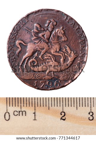 An ancient English copper coin halfpenny with the image of a sailboat and St. George. Reverse. Isolated on white