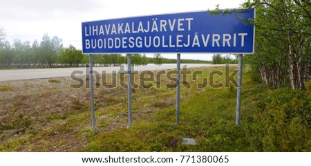 Lhavakalajarvet Buoiddesguollejavrrit, finnish traffic sign with the name of village Lhavakalajarvet written in finnish and Sami language.