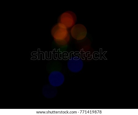 Christmas Bokeh On Dark Background. Selective Focus. Image For Templates, Placards, Banners, Presentations, Reports, Card And Wallpaper. etc.