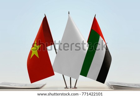 Flags of Vietnam and UAE with a white flag in the middle