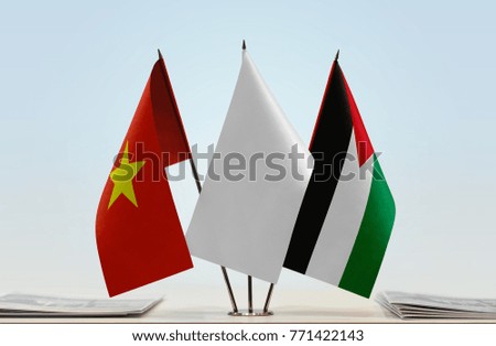 Flags of Vietnam and Palestine with a white flag in the middle