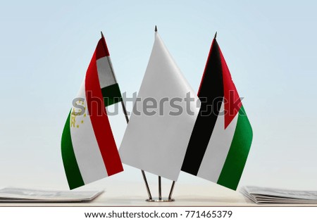 Flags of Tajikistan and Jordan with a white flag in the middle