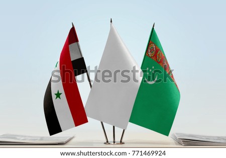 Flags of Syria and Turkmenistan with a white flag in the middle