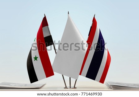 Flags of Syria and Thailand with a white flag in the middle
