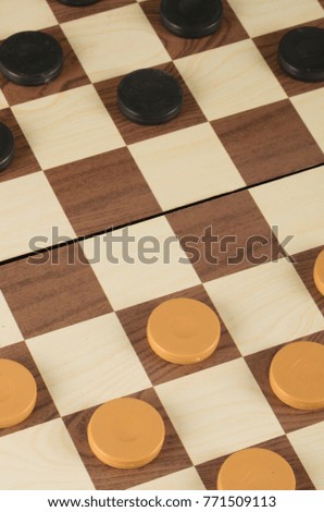 checkerboard with checkers. game concept.board game.hobby.checkers on playing field for a game