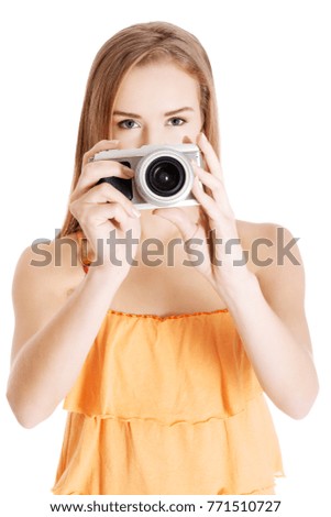 Beautiful caucasian summer woman taking photo.