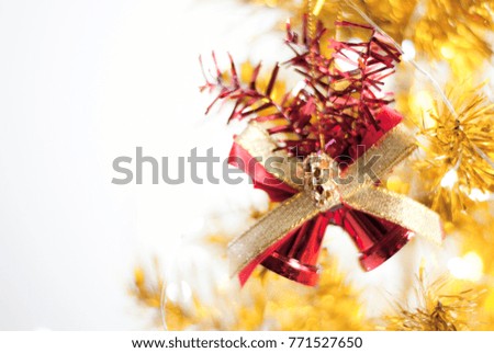 Red bell on a gold Christmas tree On white background, picture for background