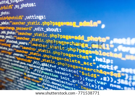 New technology revolution. Displaying program code on computer.  Writing programming code on laptop. Digital binary data on computer screen. Website HTML Code on the Laptop Display Closeup Photo. 