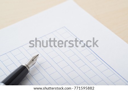 japanese squared manuscript pape with fountain pen Royalty-Free Stock Photo #771595882