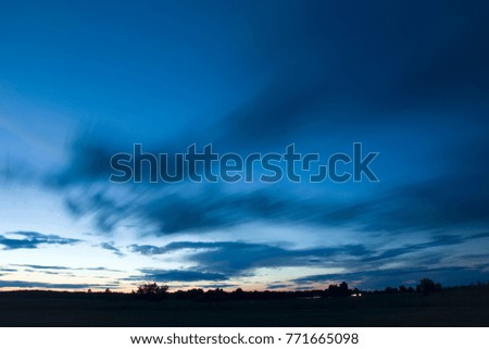 Dark navy blue clouds after sunset