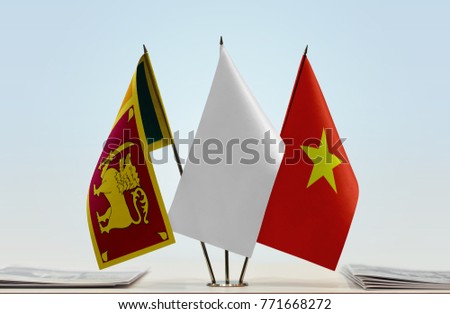 Flags of Sri Lanka and Vietnam with a white flag in the middle