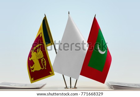 Flags of Sri Lanka and Maldives with a white flag in the middle