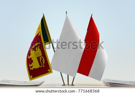 Flags of Sri Lanka and Indonesia with a white flag in the middle