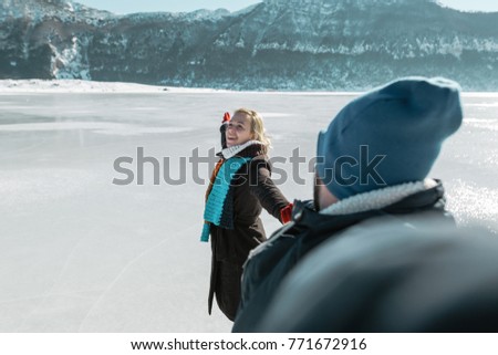 selfie in front of frozen lake 