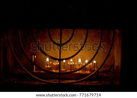Chanukah candles on street corners