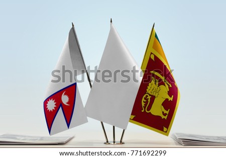 Flags of Nepal and Sri Lanka with a white flag in the middle