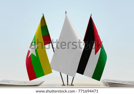 Flags of Myanmar and Jordan with a white flag in the middle