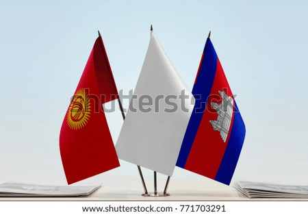 Flags of Kyrgyzstan and Cambodia with a white flag in the middle