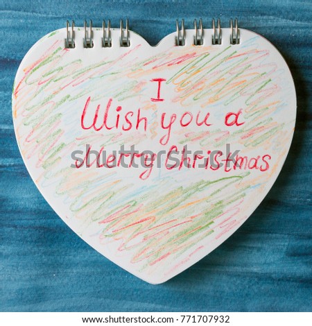 The inscription "I wish you a Merry Christmas." Greeting card. Christmas time.