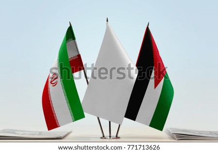 Flags of Iran and Jordan with a white flag in the middle