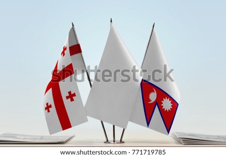 Flags of Georgia and Nepal with a white flag in the middle