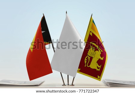 Flags of East Timor and Sri Lanka with a white flag in the middle