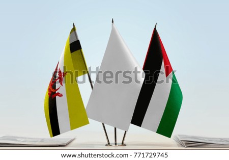 Flags of Brunei and Palestine with a white flag in the middle